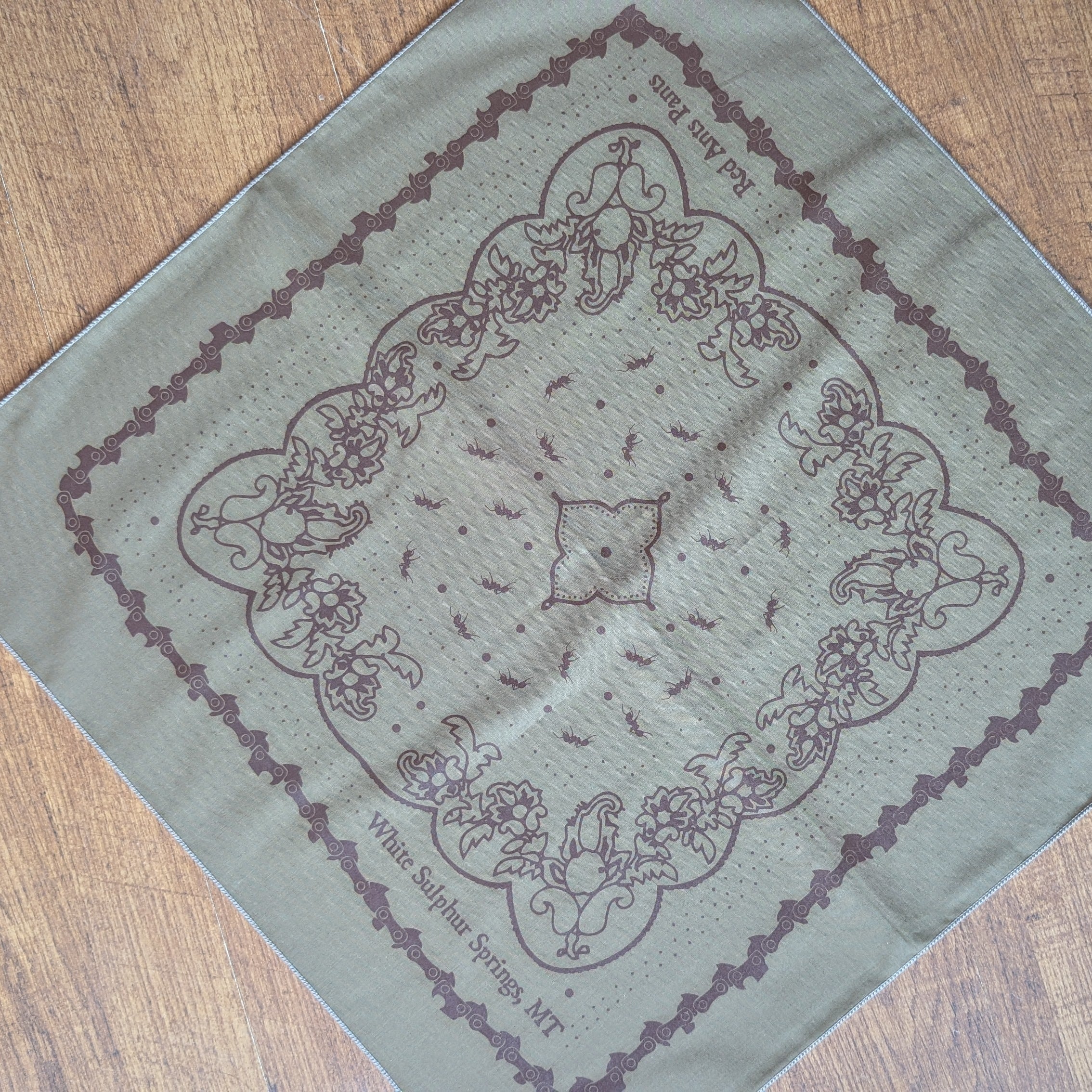 Bandana in Tan with Chainsaw Border