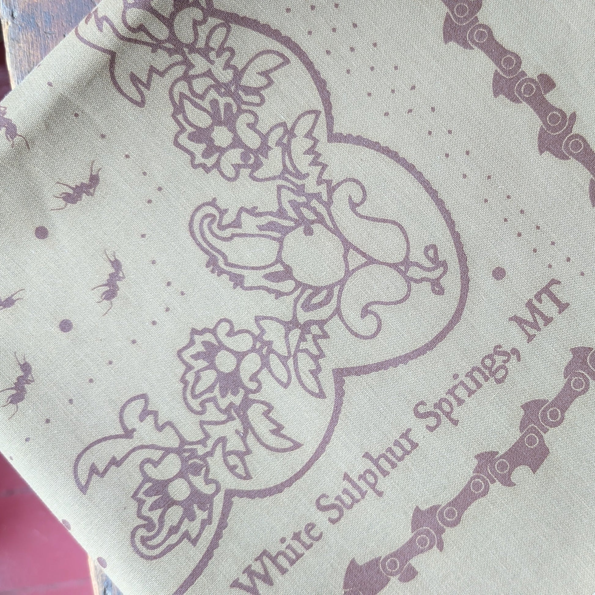 Bandana in Tan with Chainsaw Border