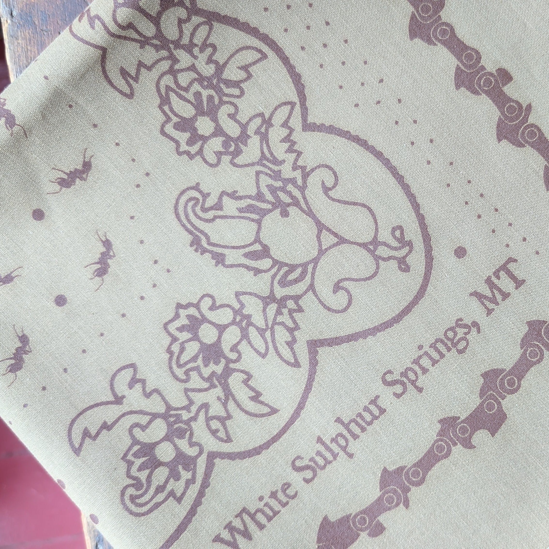 Bandana in Tan with Chainsaw Border
