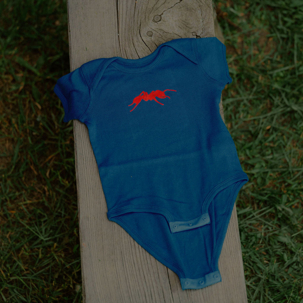 Tiny Trailblazer Onesie