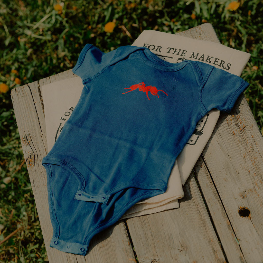 Tiny Trailblazer Onesie